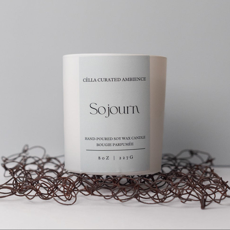 Célla Curated Ambience Sojourn scented candle in amber jar