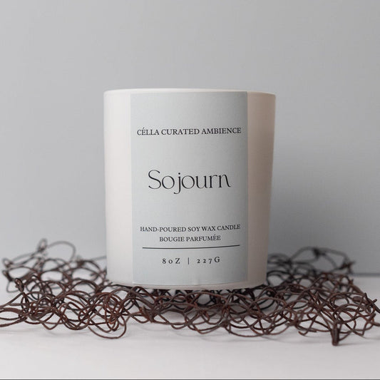 Célla Curated Ambience Sojourn scented candle in amber jar